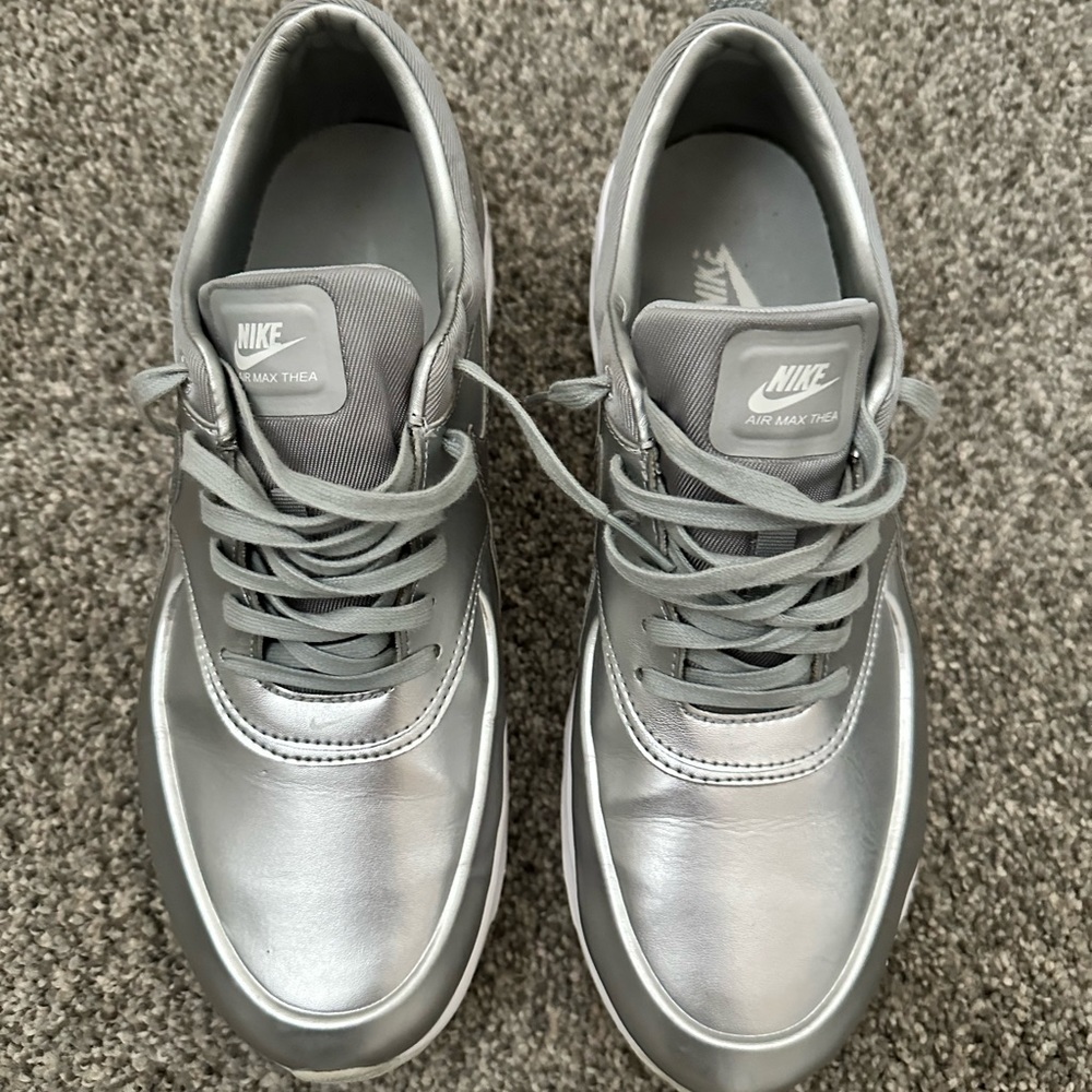 Silver nike sneakers
